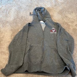 This is a gray zip up hoodie from Disney